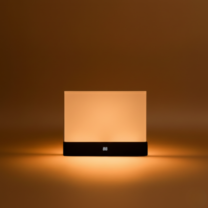 Square night light with digital display on a brown background